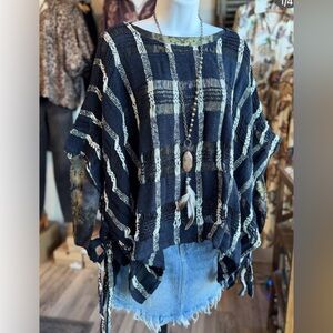 Open weave black and cream poncho